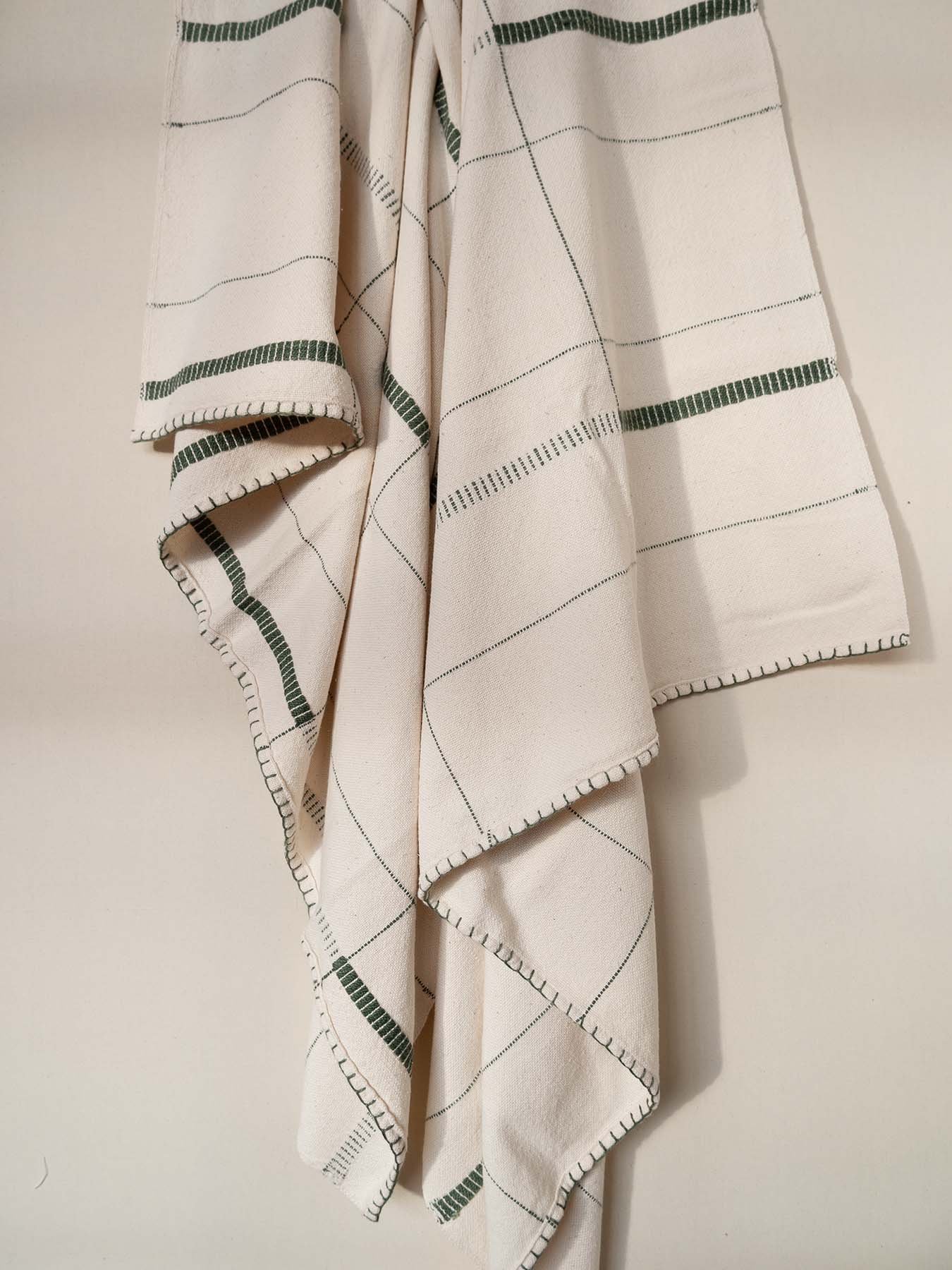 an image of the altar throw, handwoven cotton with blanket stitch hem