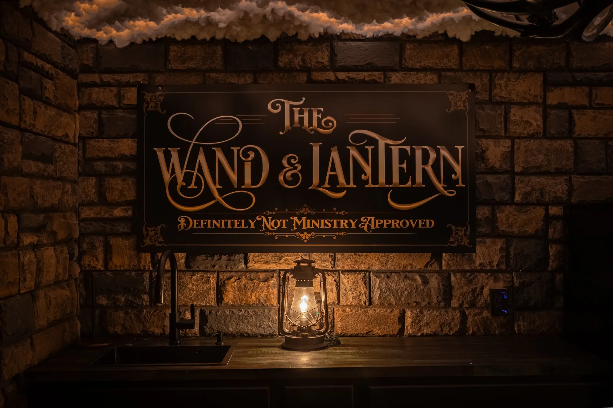The speakeasy sign at the wand and lantern tavern