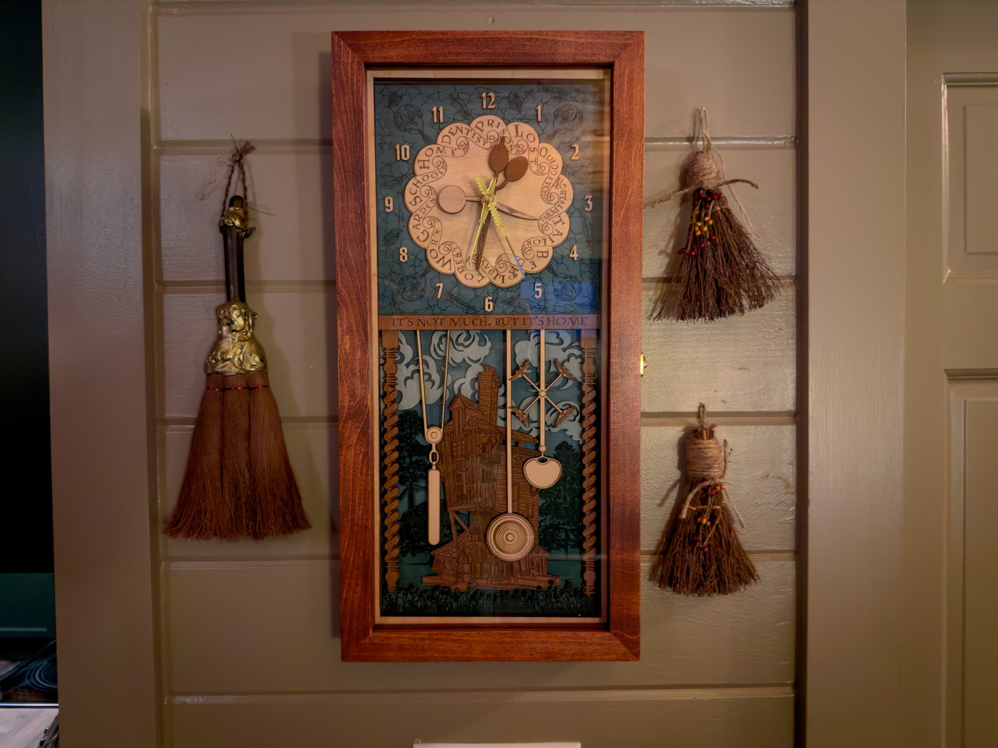The weasley clock in the living room at the wizard hideout
