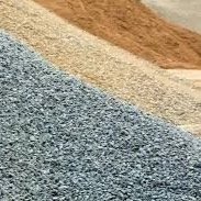 Close-up of multiple colored textured surfaces, including blue, white, beige, and brown.