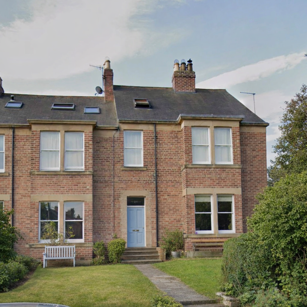A beautiful red-brick end terrace house with chimney stack in central Hexham, repointed in lime  by Ash of Northumbrian Pointing