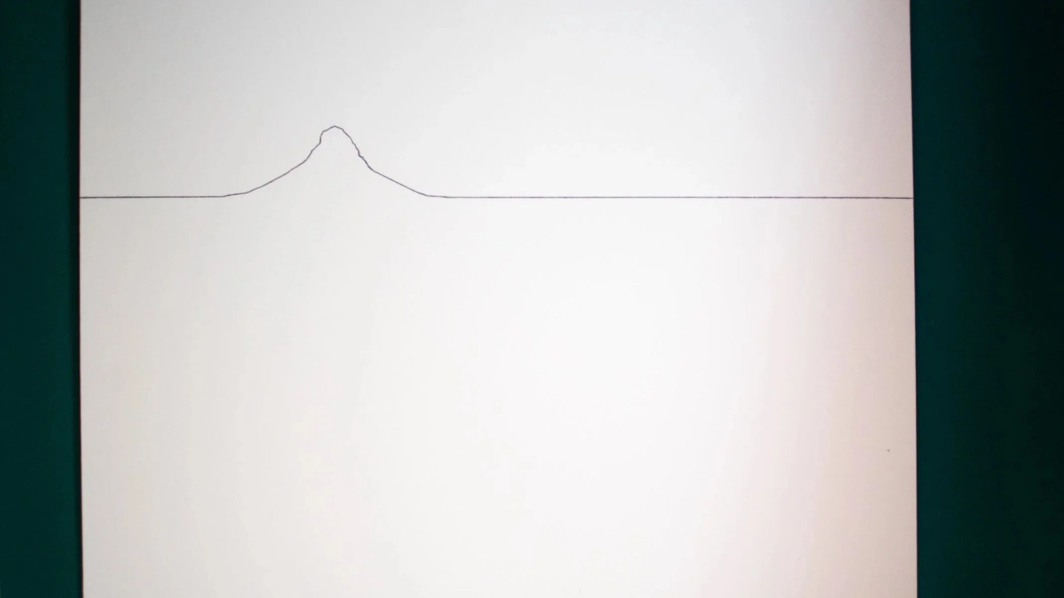Linienberg featuring a hand-drawn minimalist mountain silhouette in black on a white ground.