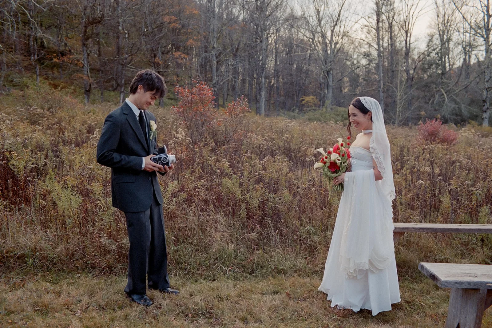 groom taking a photo of bride at handsome hollow on film