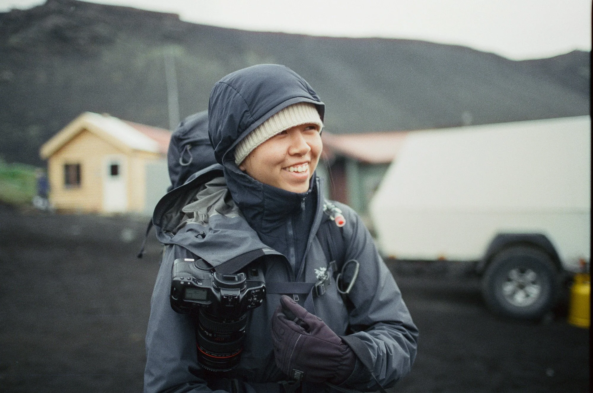 Portrait of film photographer in hiking gear in Icelandic highlands