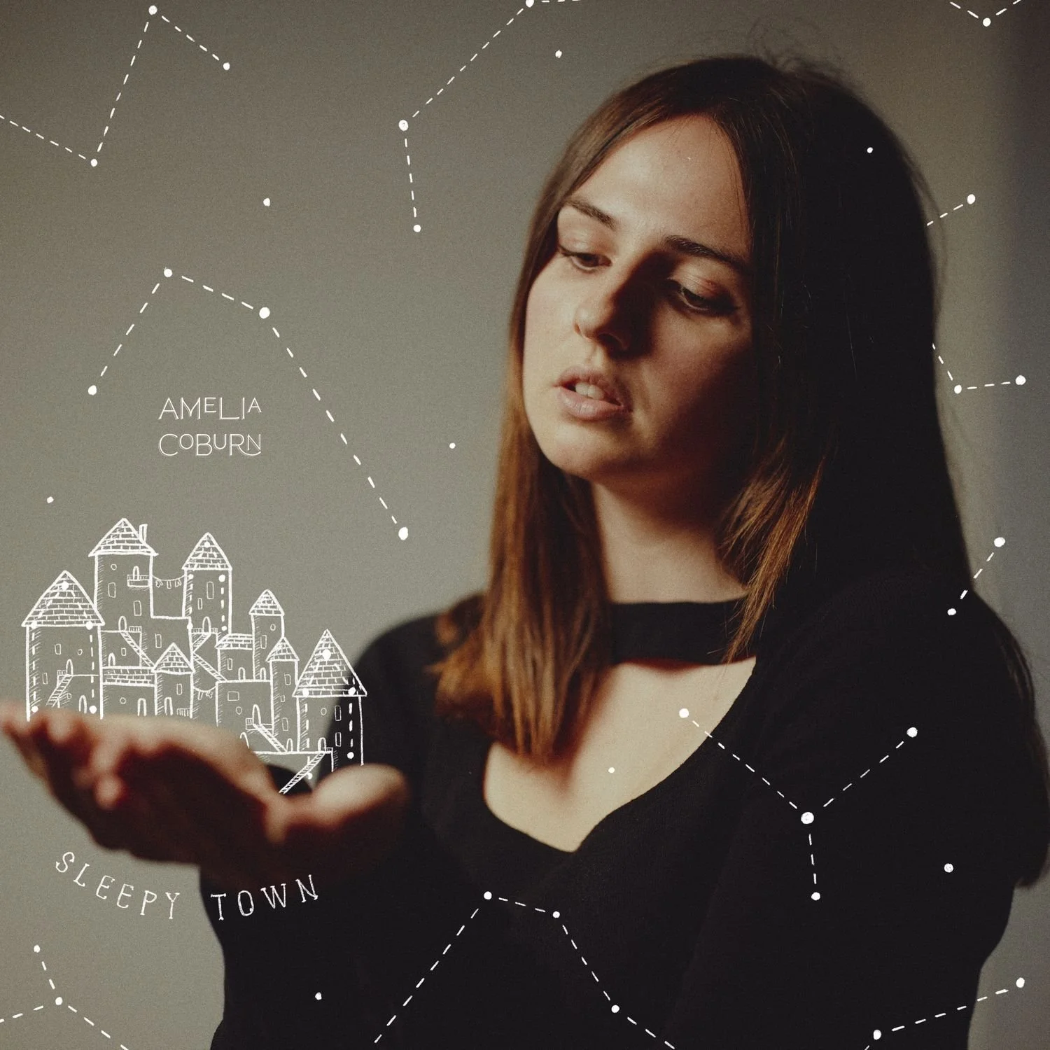 A young woman with brown hair looking at a smartphone with stars and a castle drawn on the image, labeled 'Amelia Coburn' and phrases 'Sleepy Town' and 'Sleepy Town' in the background.