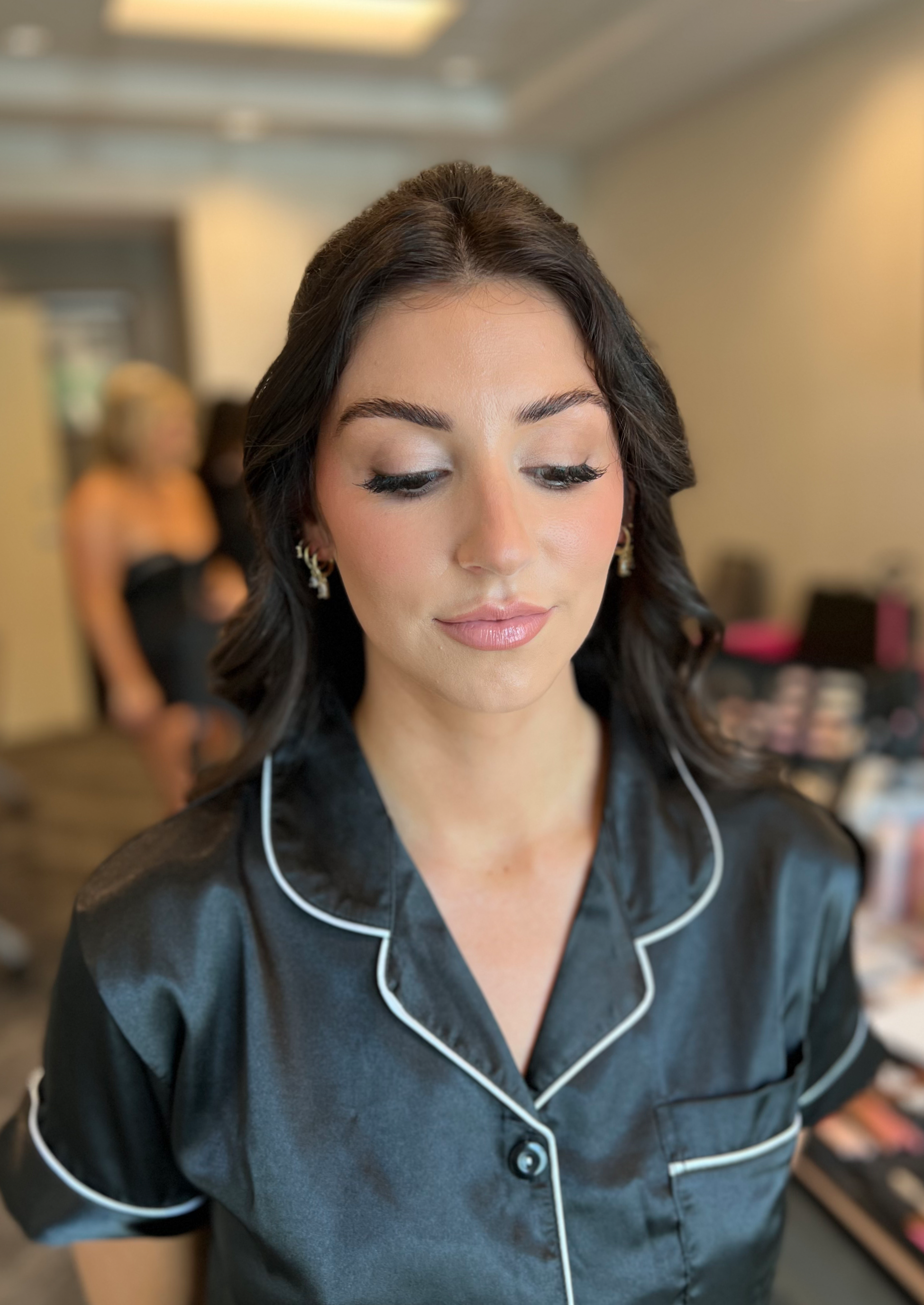 Bride getting her makeup done by Shannon Sharland, a bridal makeup artist in Newport Rhode Island