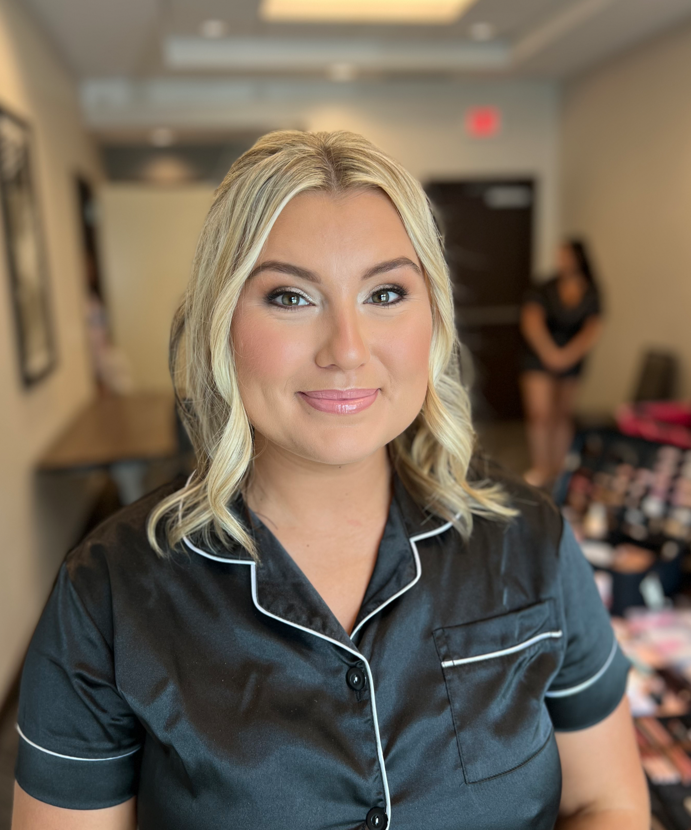 Bride getting her makeup done by Shannon Sharland, a bridal makeup artist in Newport Rhode Island