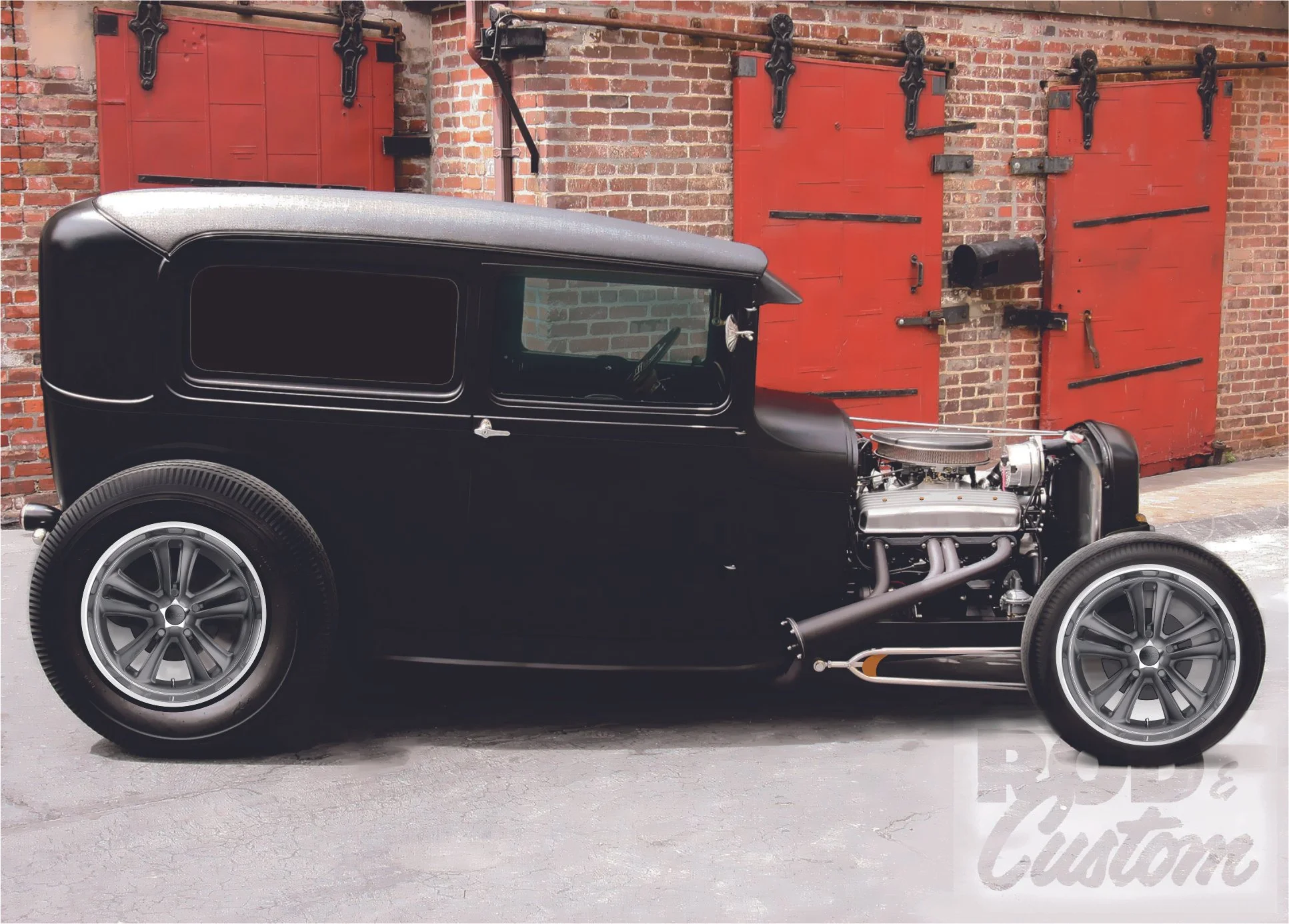 A vintage black hot rod 31 Ford sedan.