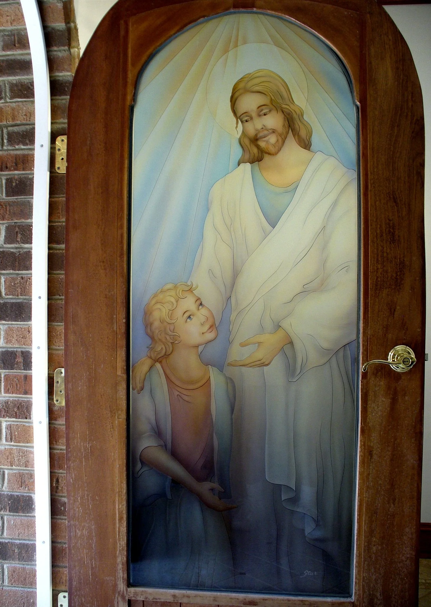 CARVED AND PAINTED GLASS DOOR TO CHAPEL WITH JESUS