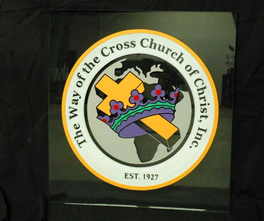 Logo of the Cross Church of Christ, Inc., featuring a map of Africa with a crown and a cross, and the text "The Way of the Cross Church of Christ, Inc." and "EST. 1927".