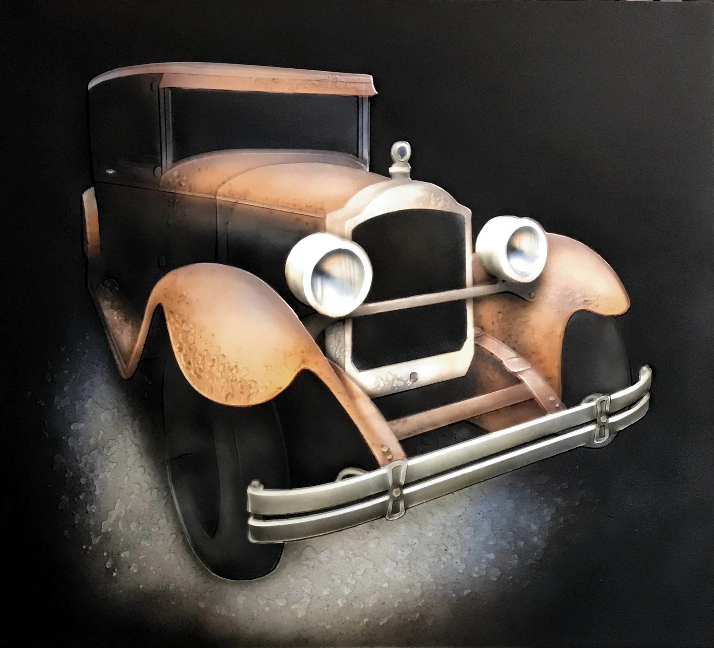 A vintage toy car resembling early 20th-century automobile with rusted metal parts, round headlights, a black grille, and a silver bumper against a dark background.