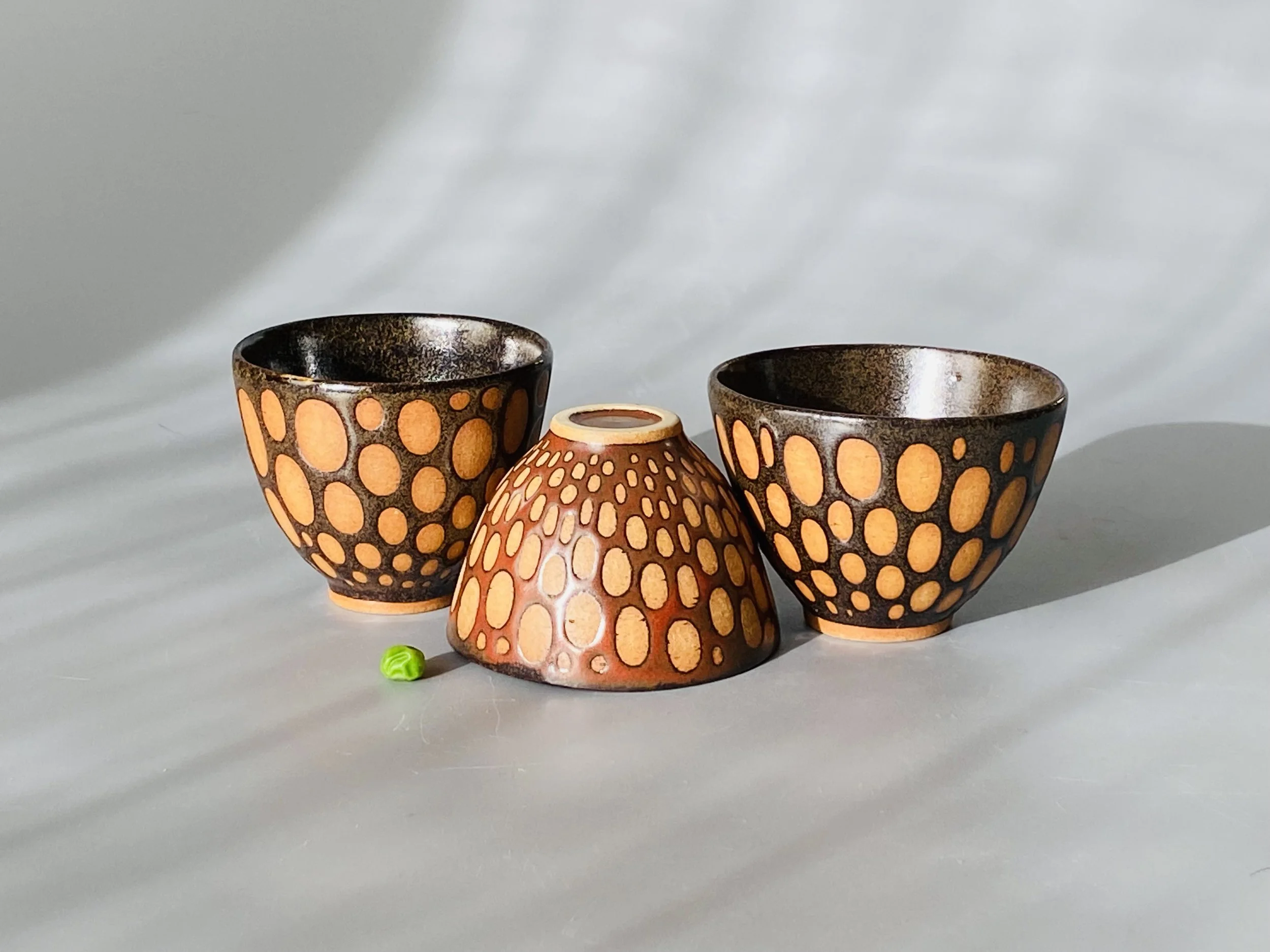 three burnished stretch tiny bowls.jpeg