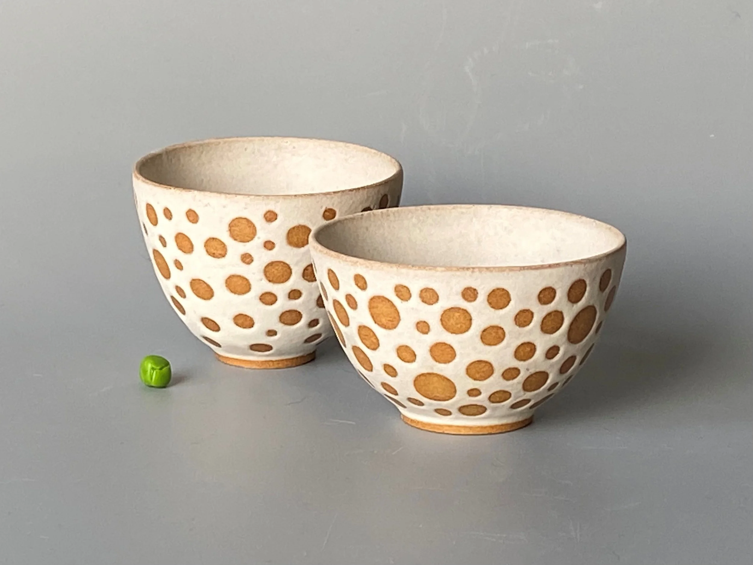 two white small circles cups.jpg