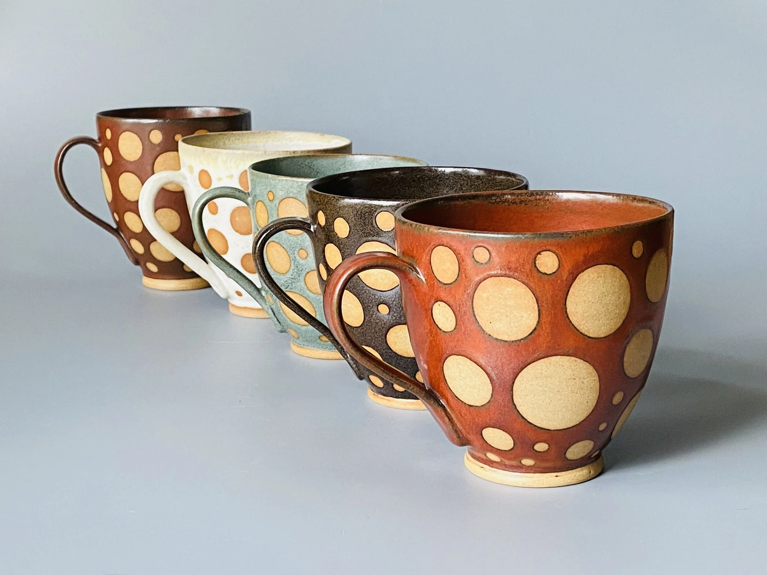 Burnished circles mugs.jpeg