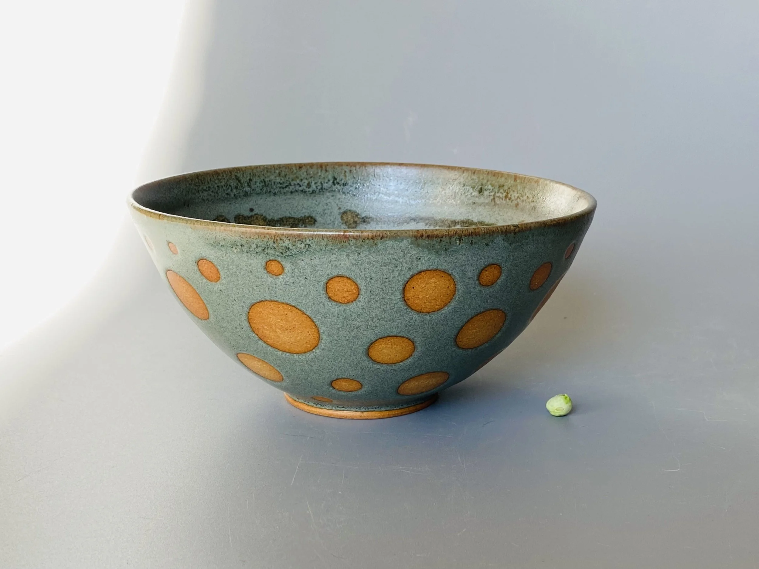 Burnished green circles bowl small.jpeg