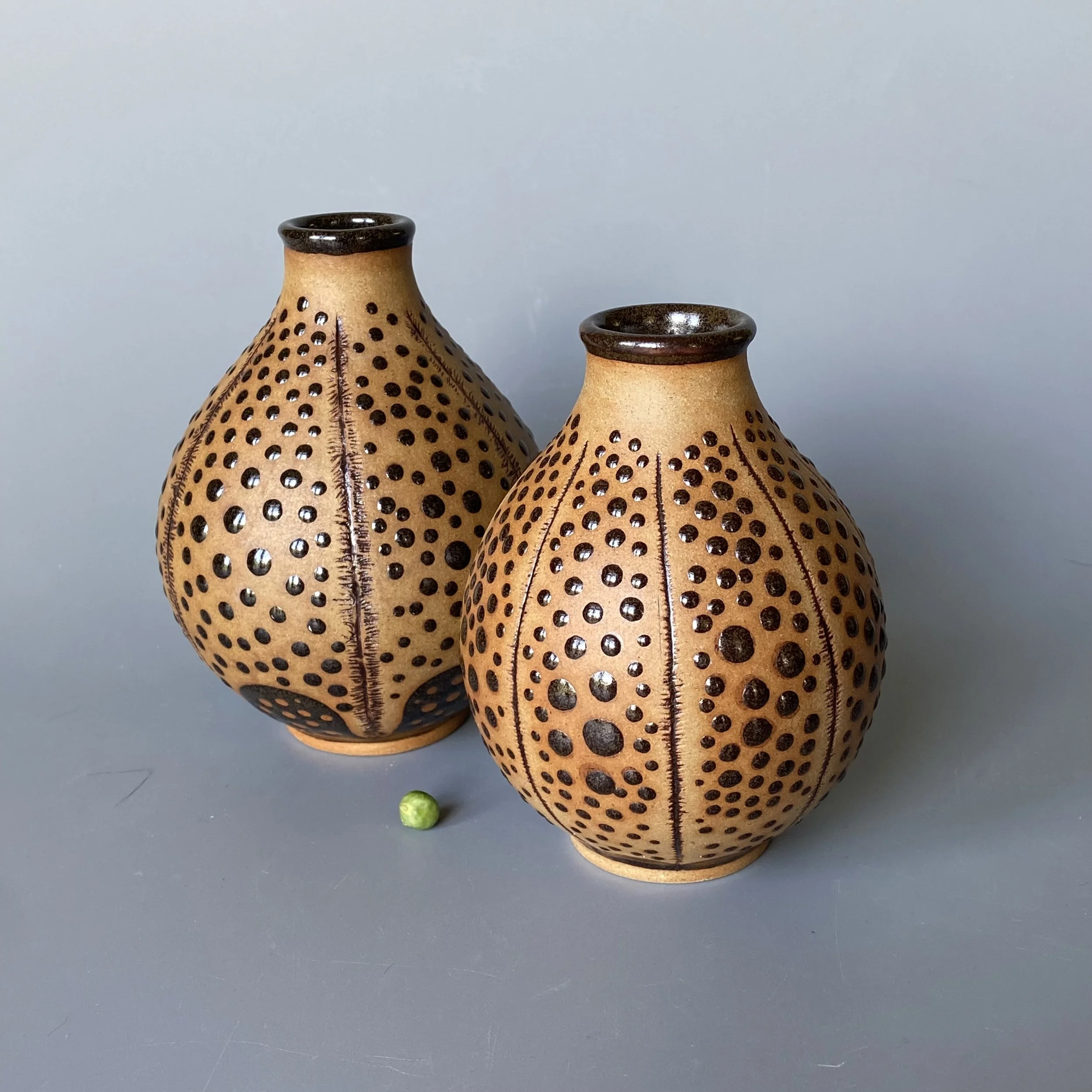 Burnished segmented dot pod bottles.jpeg