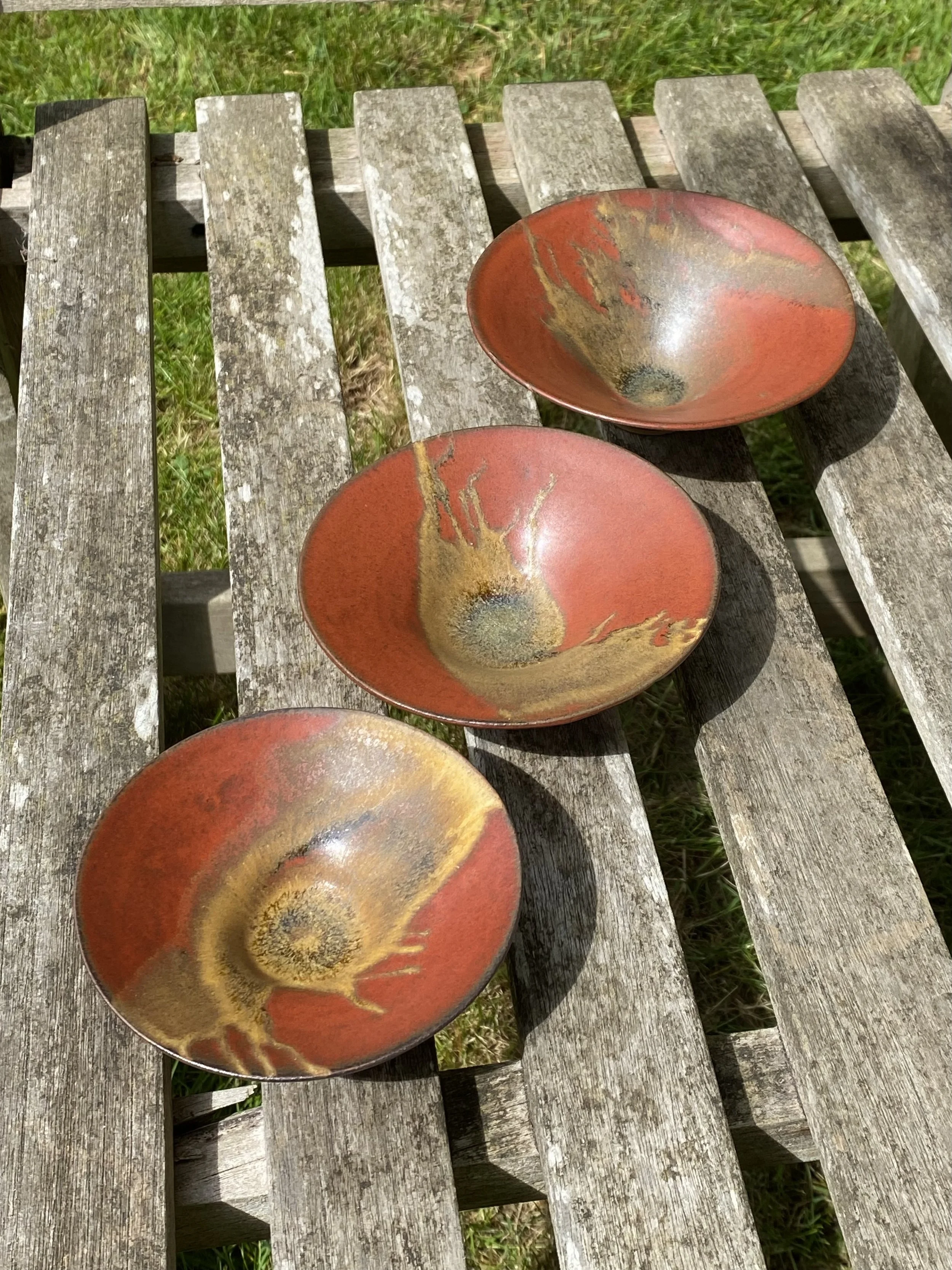 three flared ochre red.jpg
