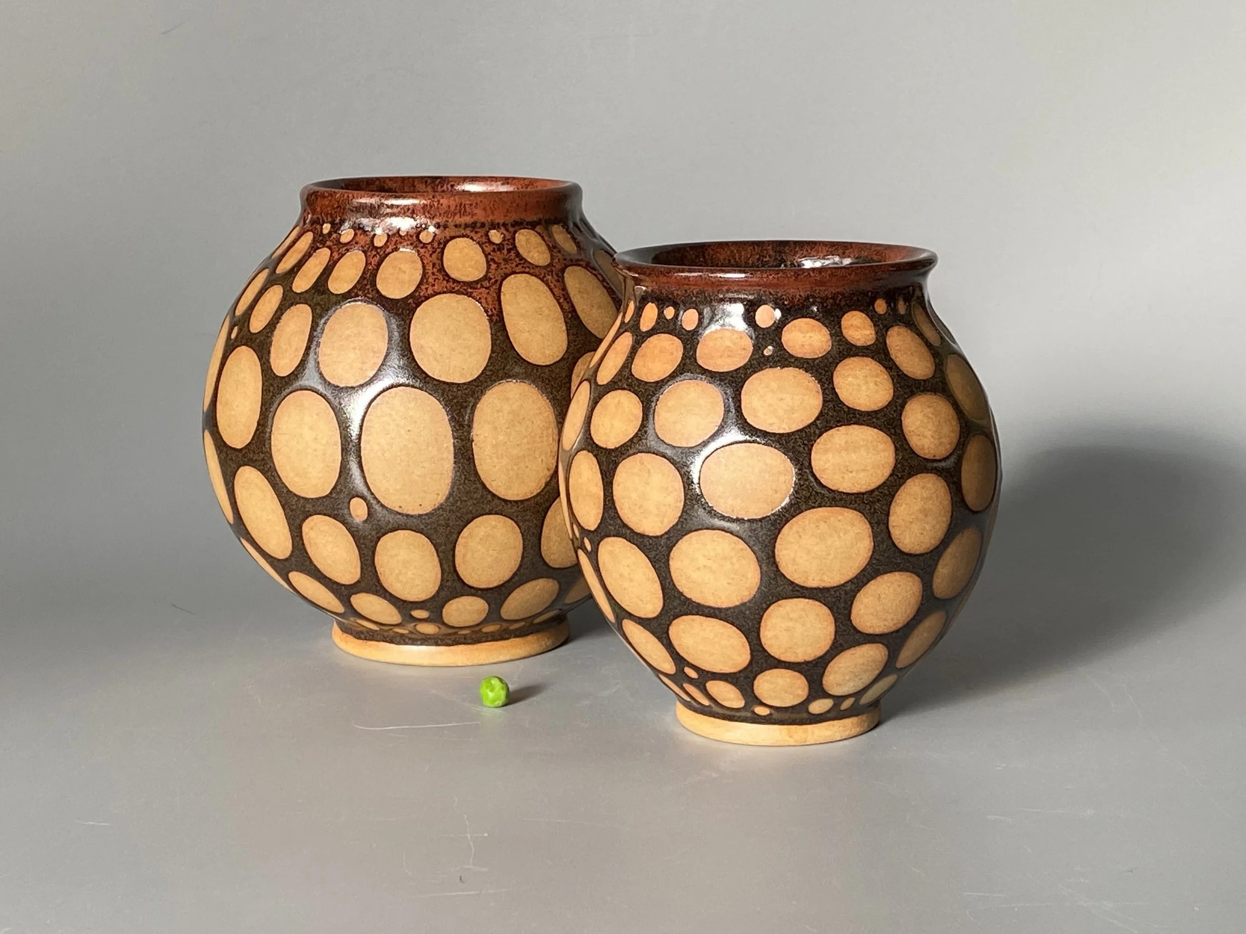 Two burnished stretch jars.jpeg