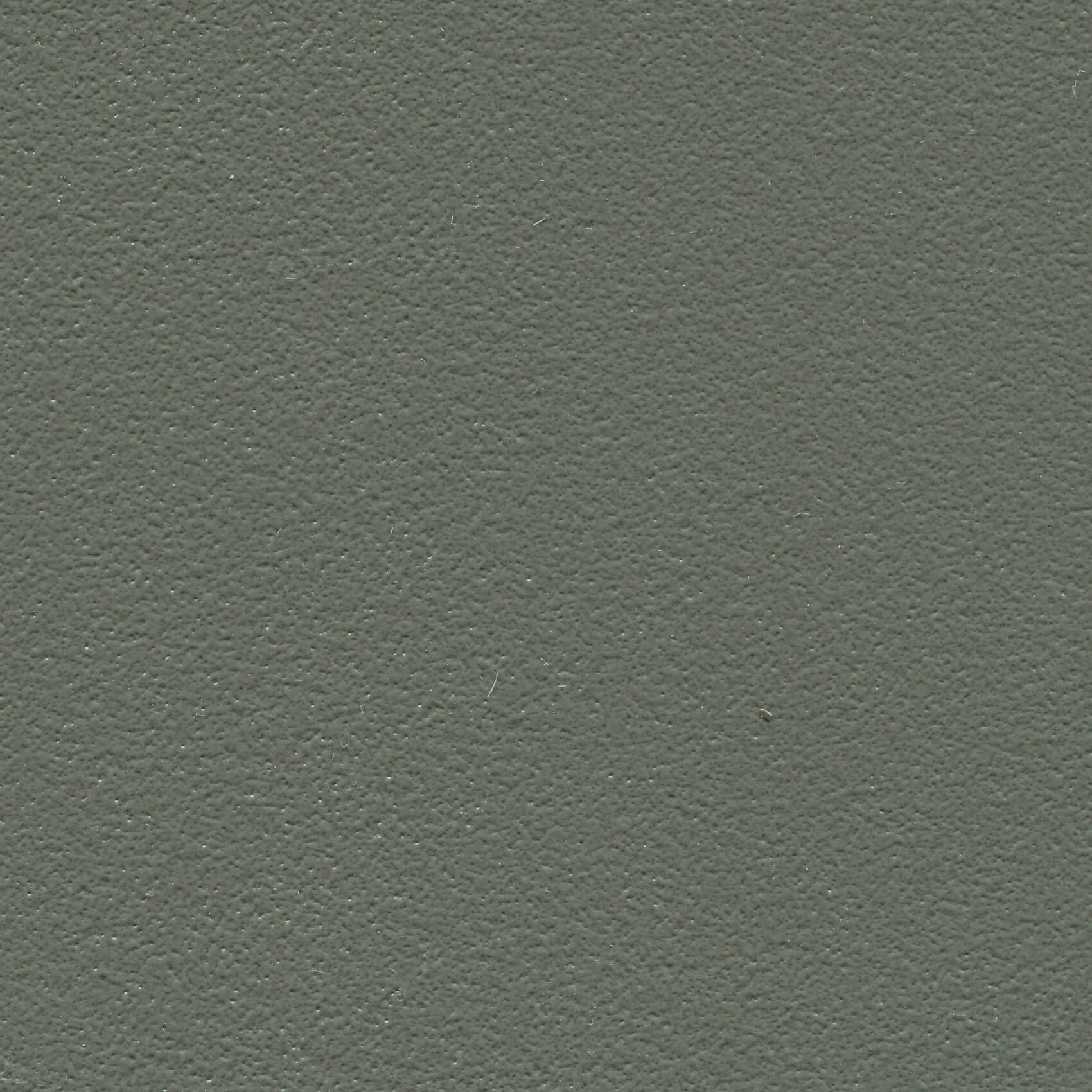 Close-up view of a textured, matte gray surface.