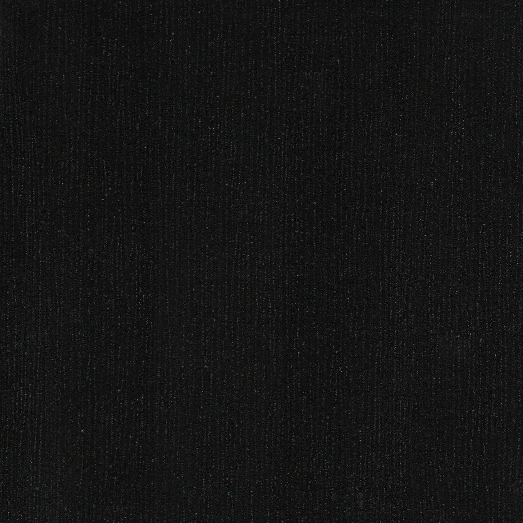 Solid black textured background.