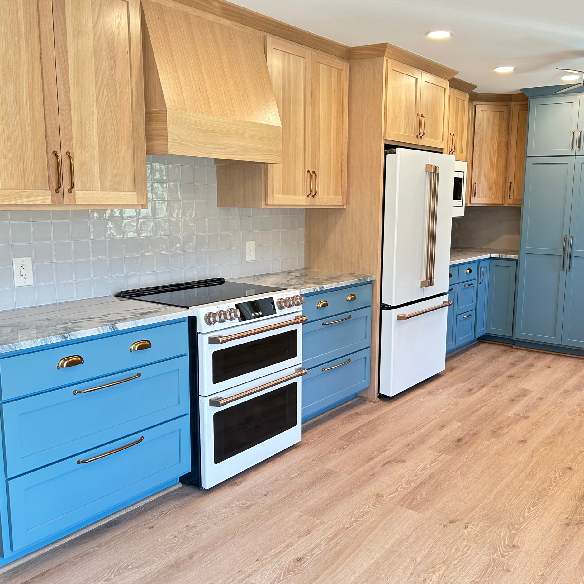 Two-Tone Kitchen with Rift White Oak Wall Cabinets & Labradorite Base Cabinets