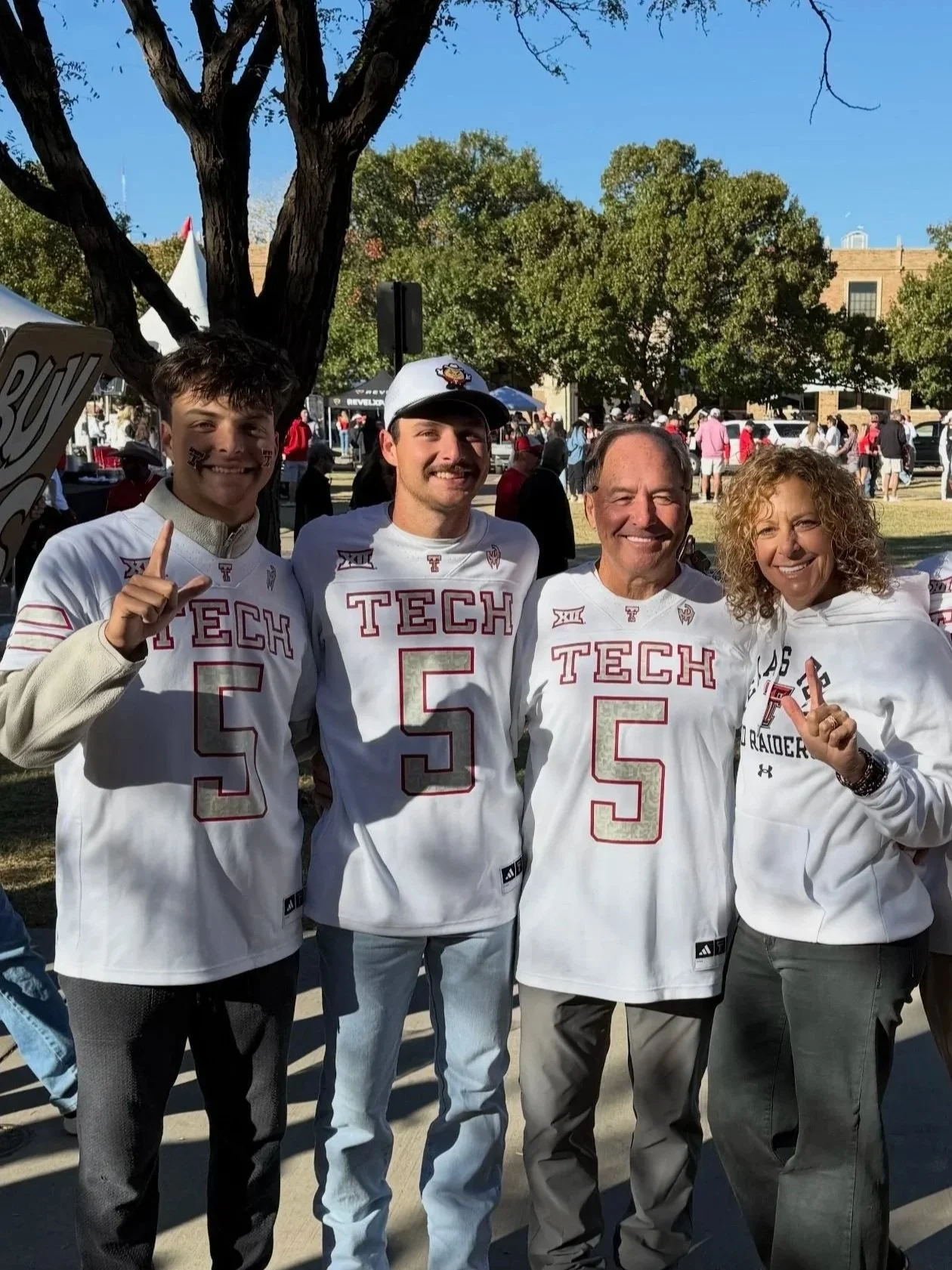 Gridiron Glamping owners enjoying a Texas Tech football game with family