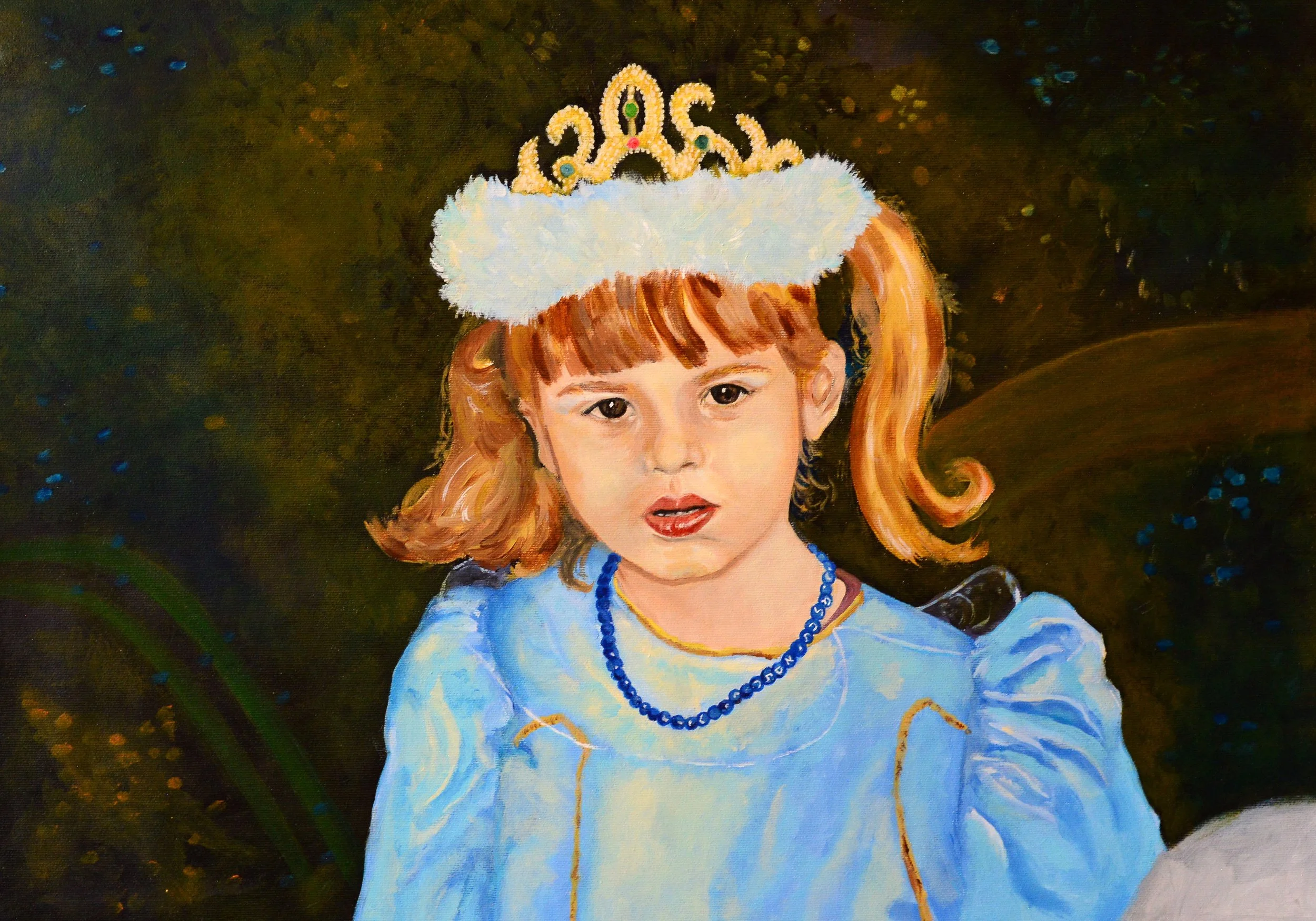 A young girl with red hair, wearing a light blue dress, blue necklace, and tiara, against a dark sparkly background.