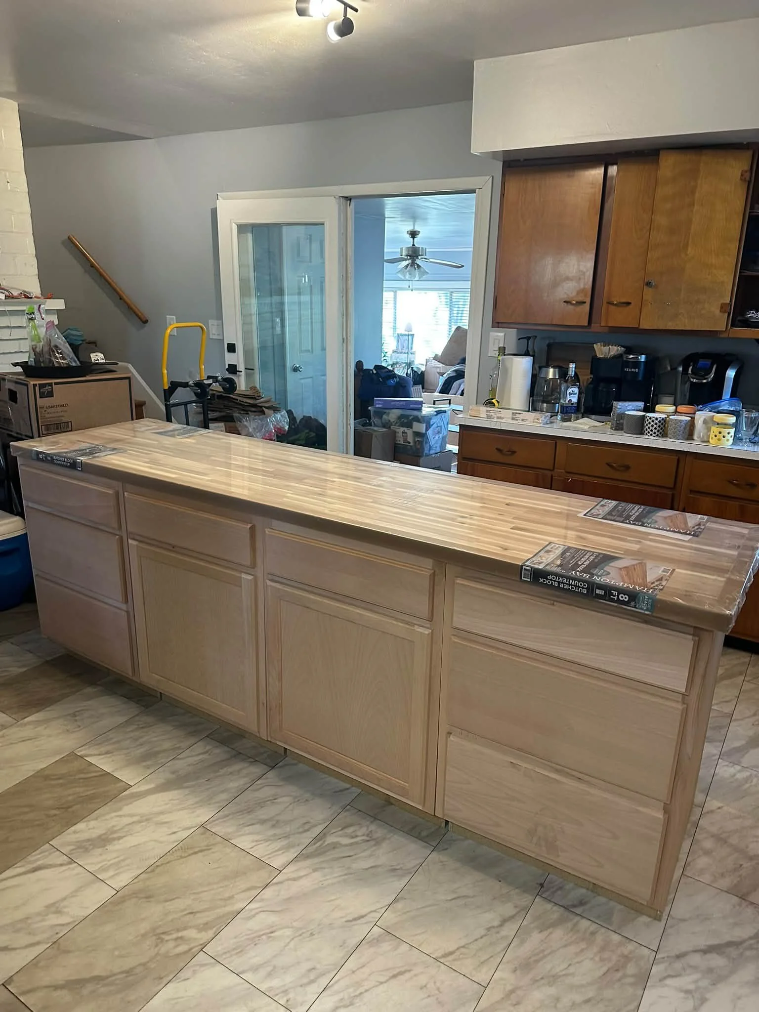 Oh I just love this color! It came out so nice. Was trying to tie it in with the coffee bar in the dining room. ￼We built this 8ft island when we moved in, but finally got it painted and added new hardware. Eventually will get ￼the rest of the cabine
