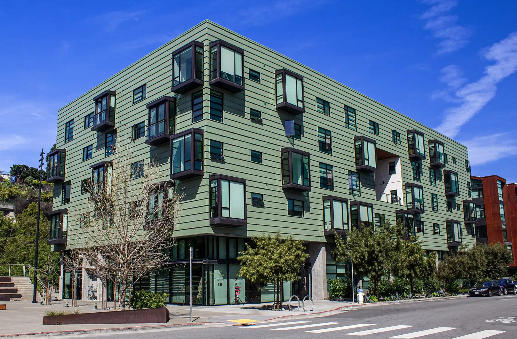 o and m building green section from across street