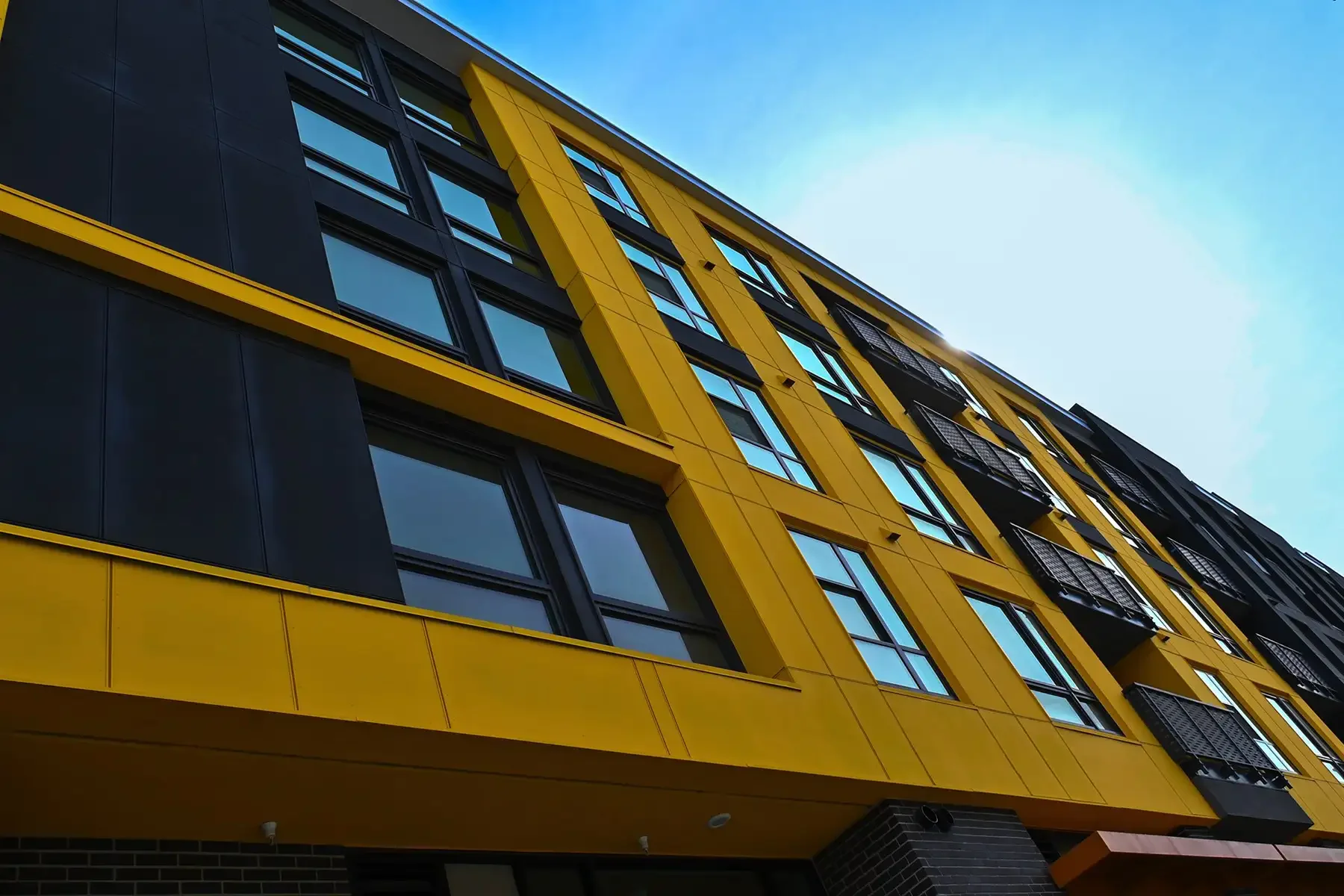 detail of platform apartments with yellow