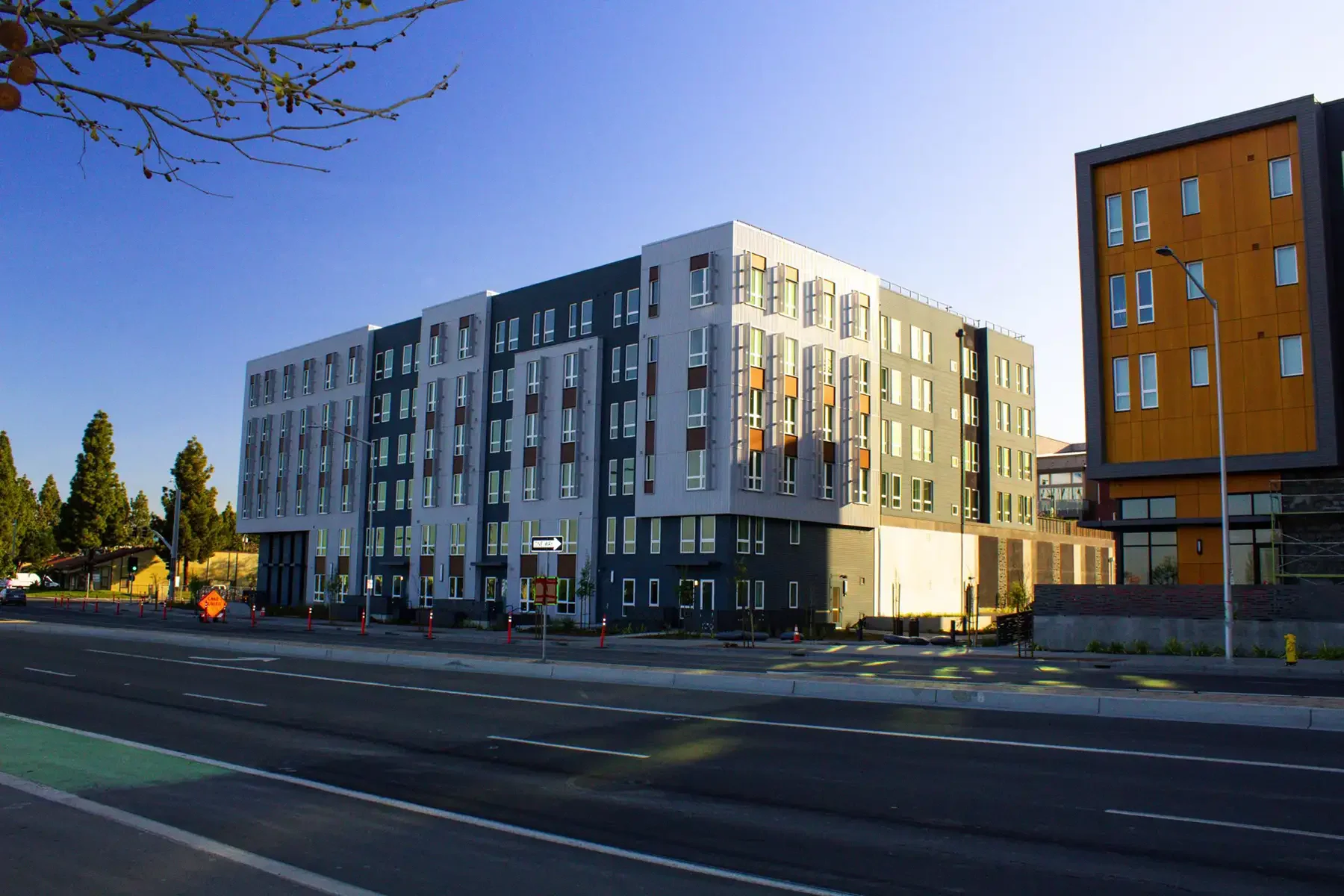 wide shot of metro crossing from across street
