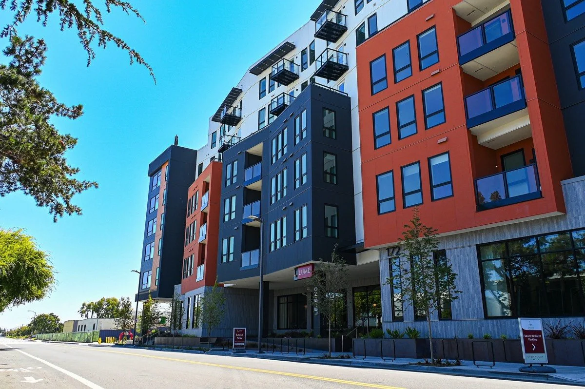 wide shot of lume building from across street