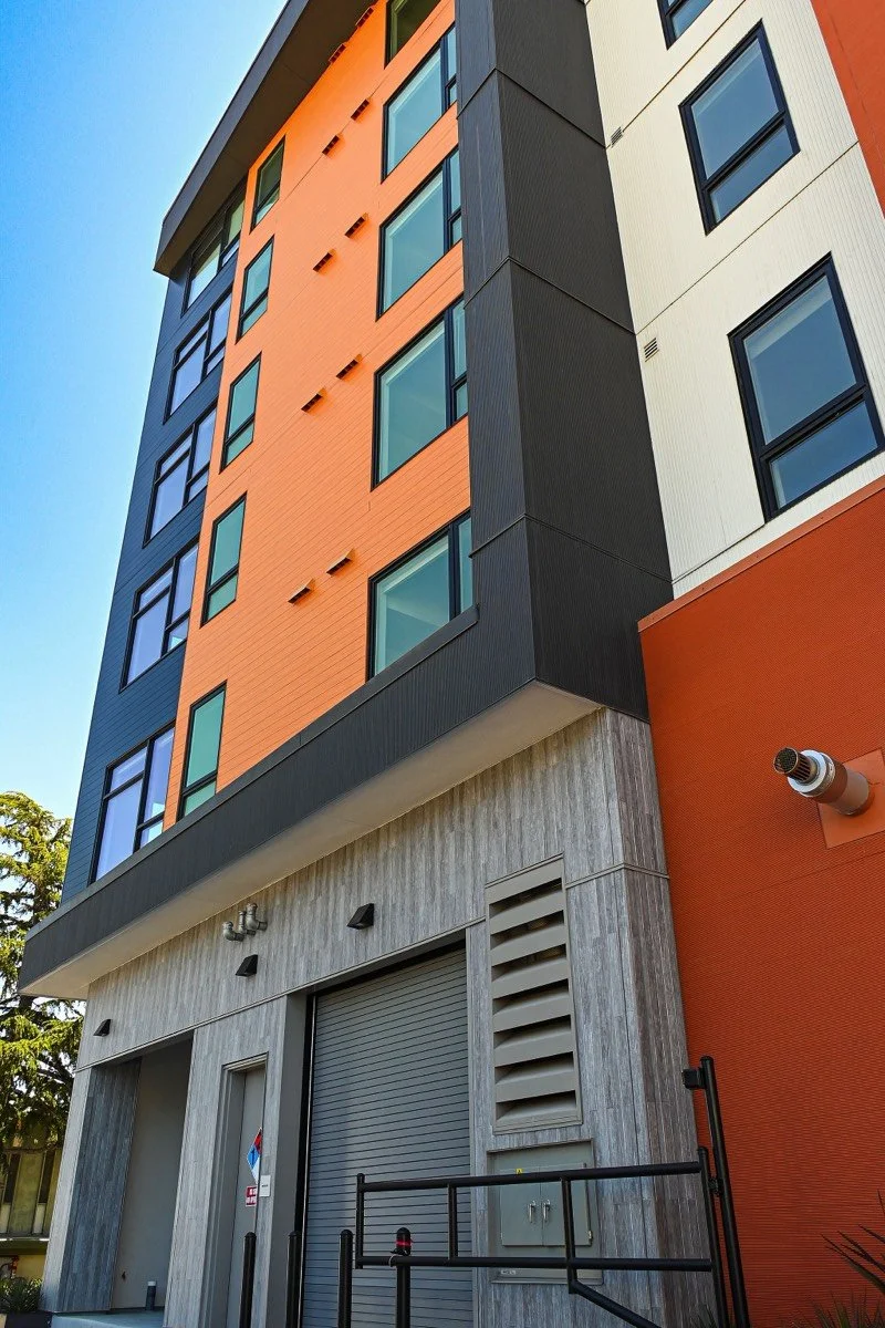 closeup of lume building section from sidewalk