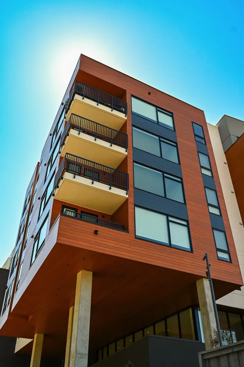 vasara exterior section with balconies looking up from sidewalk