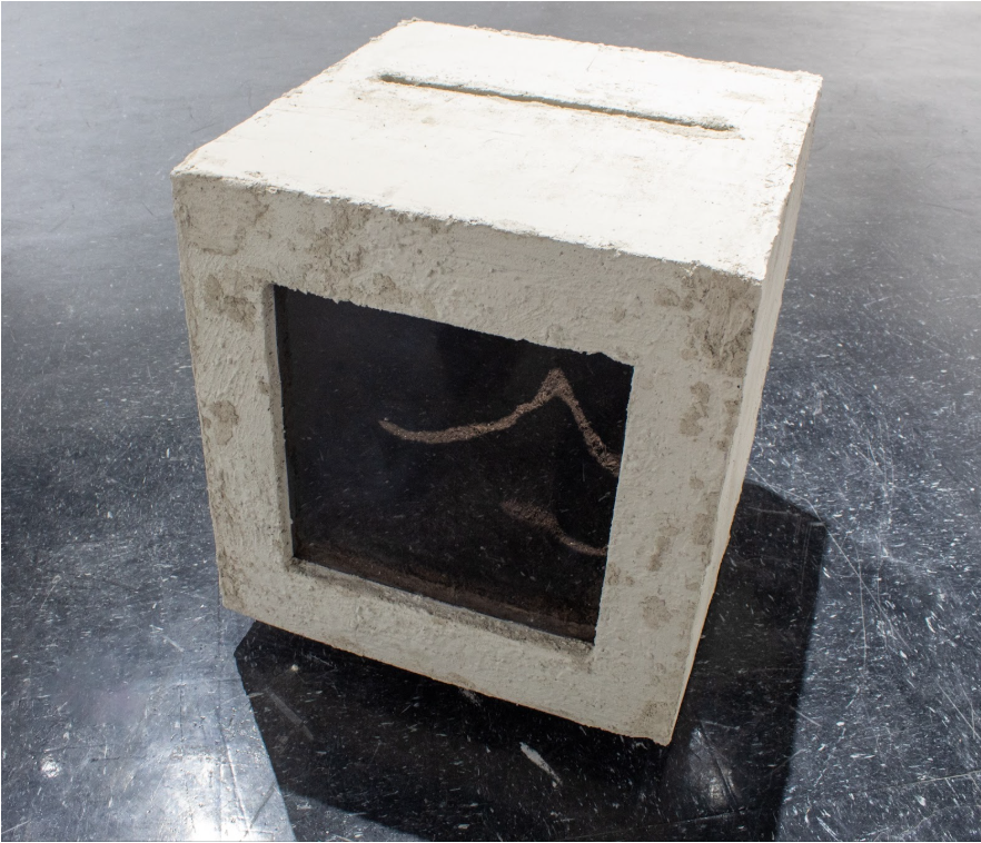 Camilo Molina
Foundation Block, 2025
Concrete, soil, foam, and cardboard

Foundation Block reimagines the concrete footing— the literal base of city construction— as a small memorial for what those foundations conceal. Inspired by the urban erasure o
