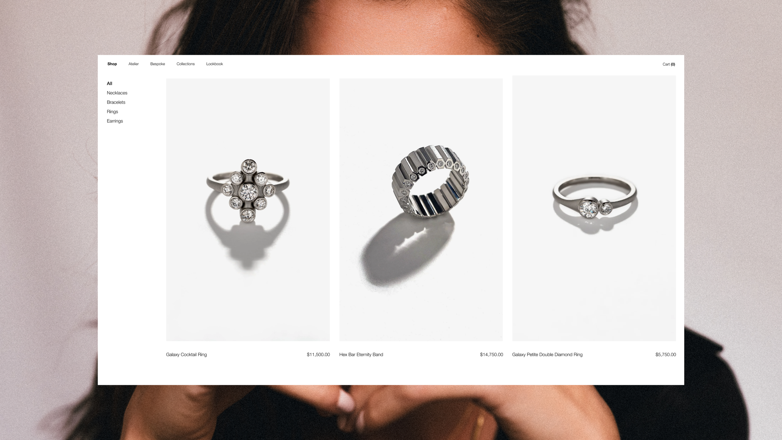 Online jewelry store displaying three silver rings with diamonds on a white background.