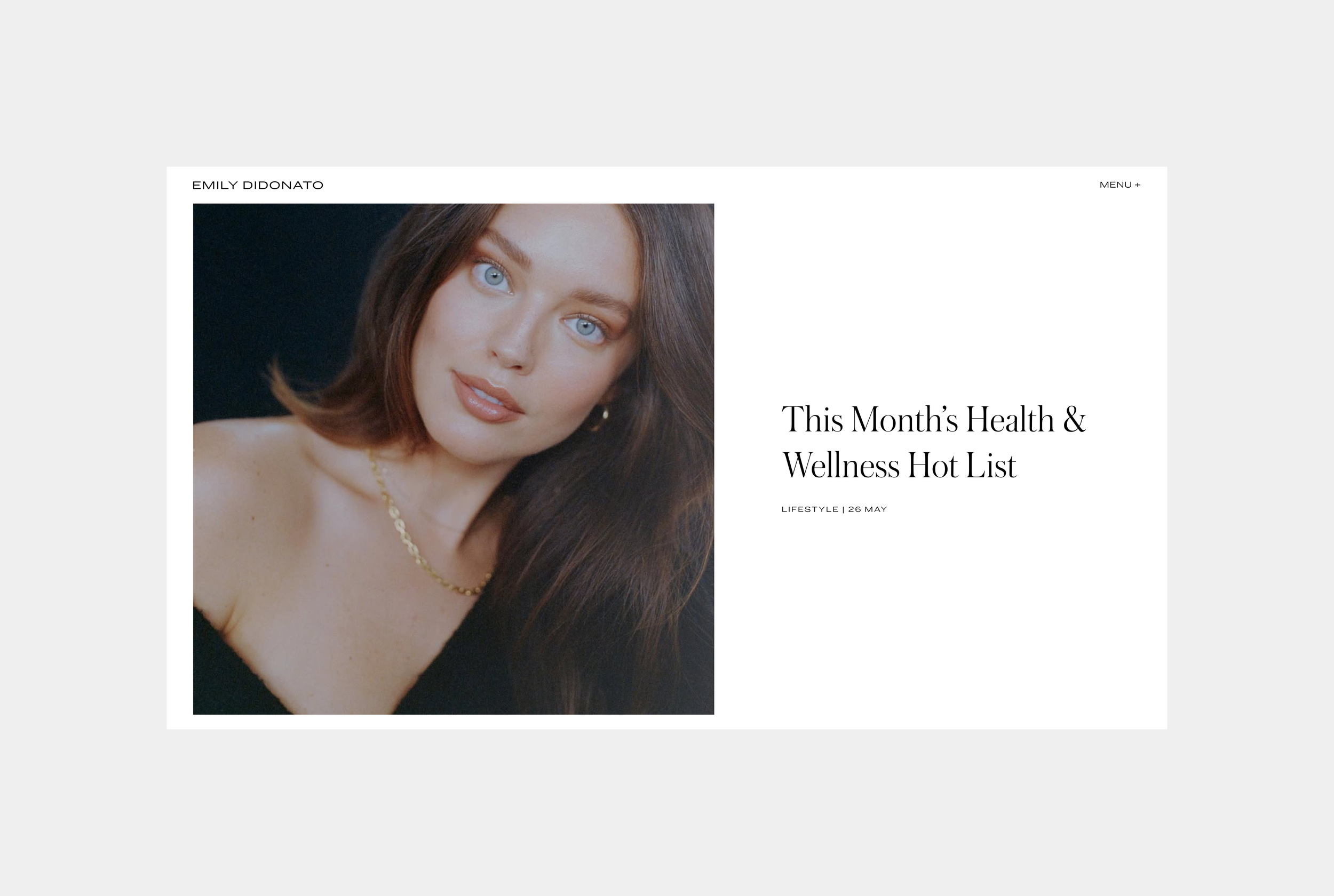 A woman with blue eyes, brown hair, and a gold necklace, looking directly at the camera, on a webpage titled 'This Month’s Health & Wellness Hot List.'