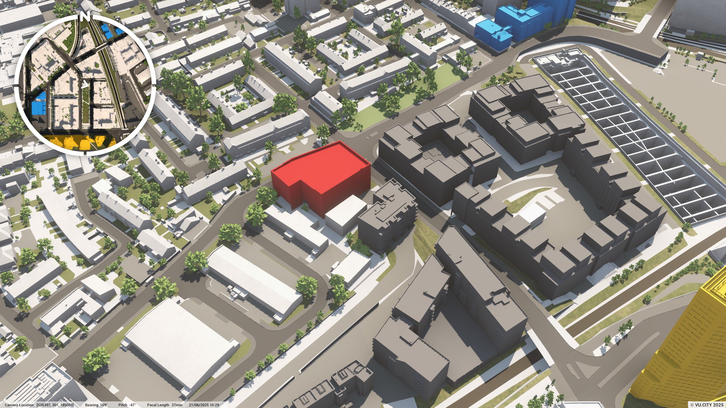 A 3D city model showing various buildings, streets, and green spaces with a highlighted rectangular building in red near the center.