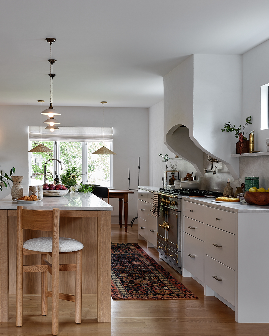 Denver kitchen renovation with plaster walls, custom cabinetry, and honed marble backsplash by Sarah Hart Interior Design, Denver Interior Designer.