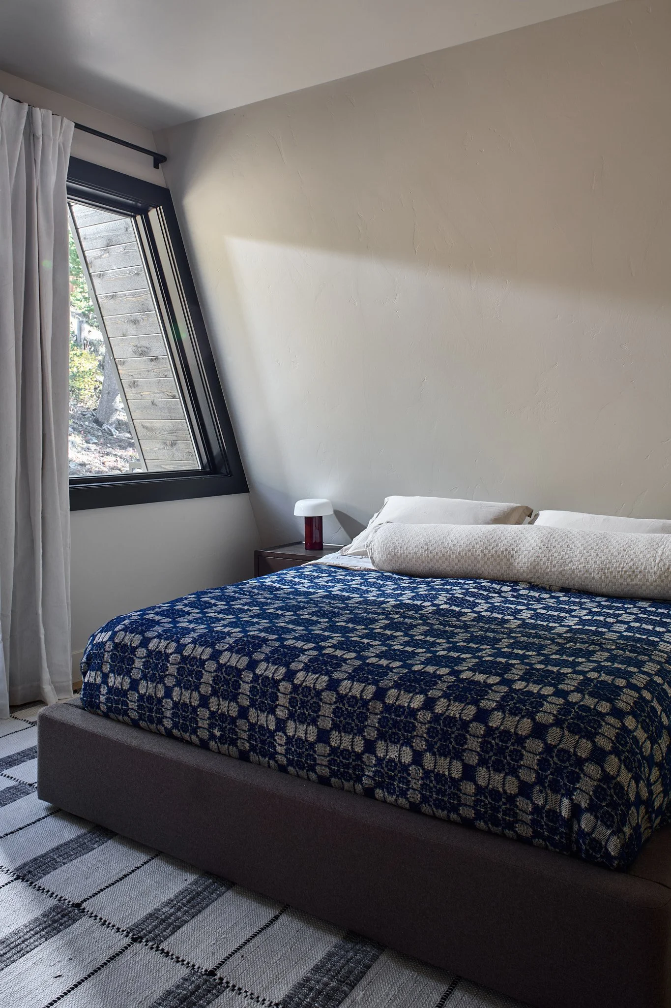 Luxury new-build A-Frame interior designed by Sarah Hart Interior Design, featuring custom white oak cabinetry, handmade ceramics, custom lighting, and bespoke furnishings in a fully managed design project.