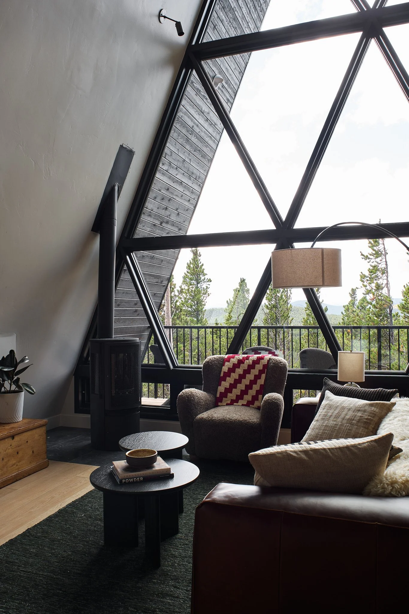Custom A-Frame short-term rental designed by Sarah Hart Interior Design in Charleston, showcasing luxury interiors with white oak cabinetry, handmade ceramics, and fully custom furnishings.