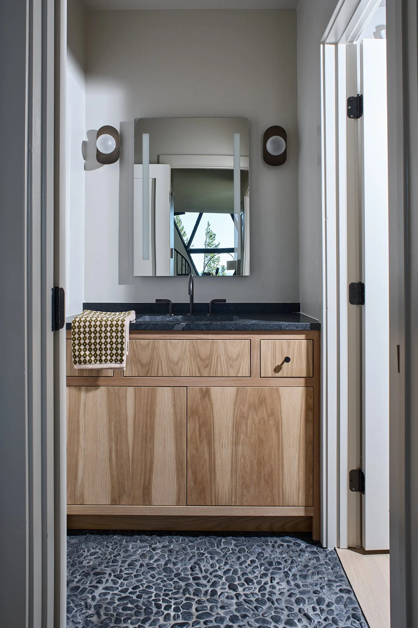 Luxury new-build A-Frame interior designed by Sarah Hart Interior Design, featuring custom white oak cabinetry, handmade ceramics, custom lighting, and bespoke furnishings in a fully managed design project.