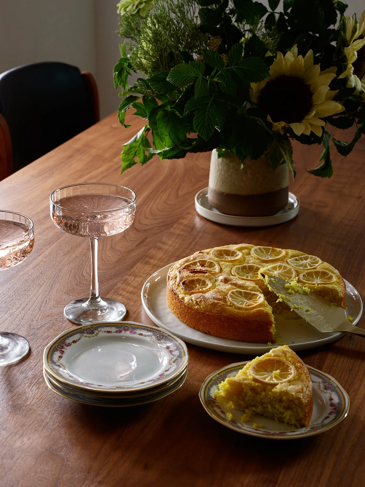 Sarah Hart Interior Design in Charleston created the Minimalist Chateau interior featuring a fully custom kitchen with La Cornue range, marble countertops, SubZero fridge, plaster walls, and custom window treatments.