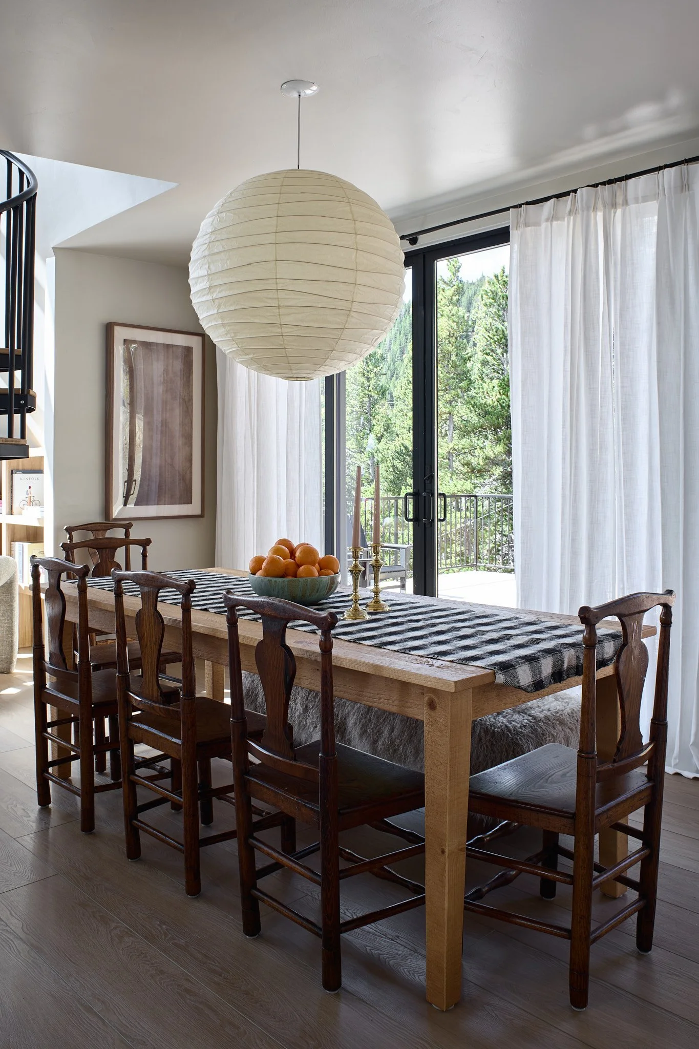 Luxury interior design by Charleston interior designer Sarah Hart for a custom new-build A-Frame luxury short-term rental, featuring white oak cabinetry, handmade ceramics, custom lighting, and bespoke furnishings.