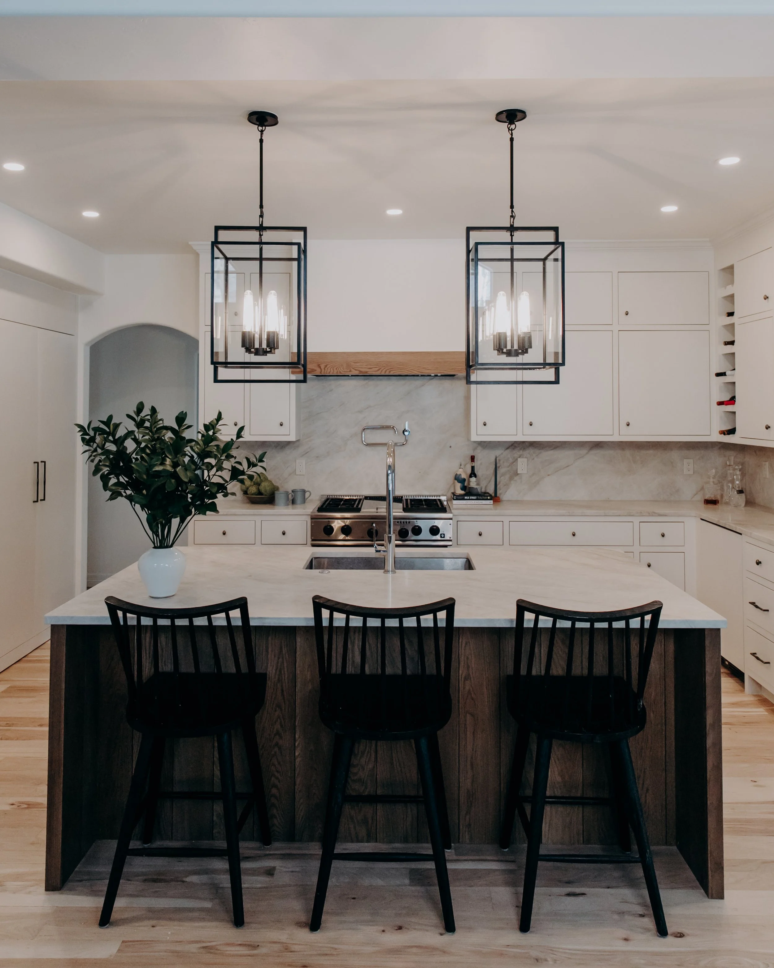 Luxury interior design by Charleston-based Sarah Hart Interior Design for a second home in the mountains of Colorado, featuring custom white oak cabinets and bespoke furnishings.