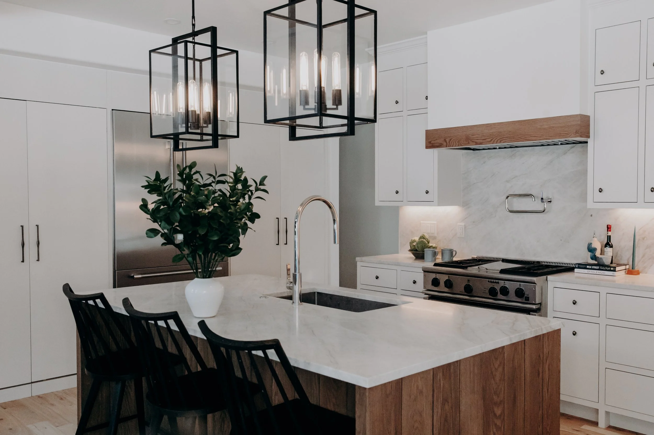 Charleston-based interior designer Sarah Hart designed this modern mountain retreat second home in Colorado, showcasing custom white oak cabinets and elevated, timeless interiors.