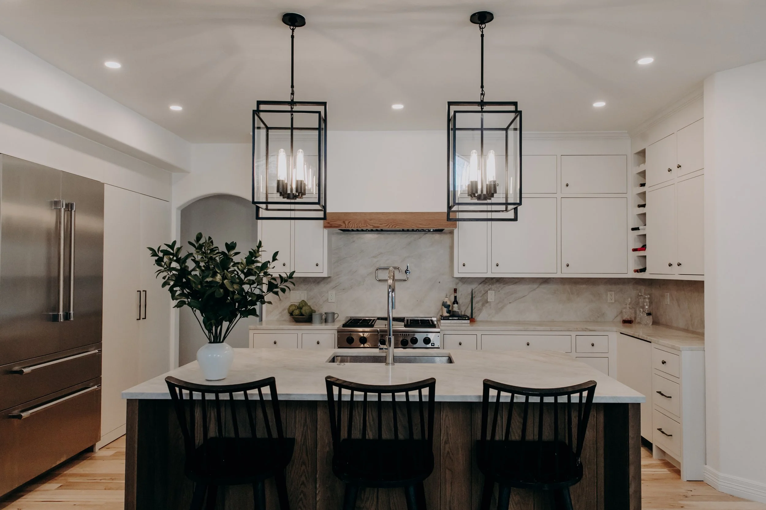Luxury interior design by Charleston-based Sarah Hart Interior Design for a second home in the mountains of Colorado, featuring custom white oak cabinets and bespoke furnishings.