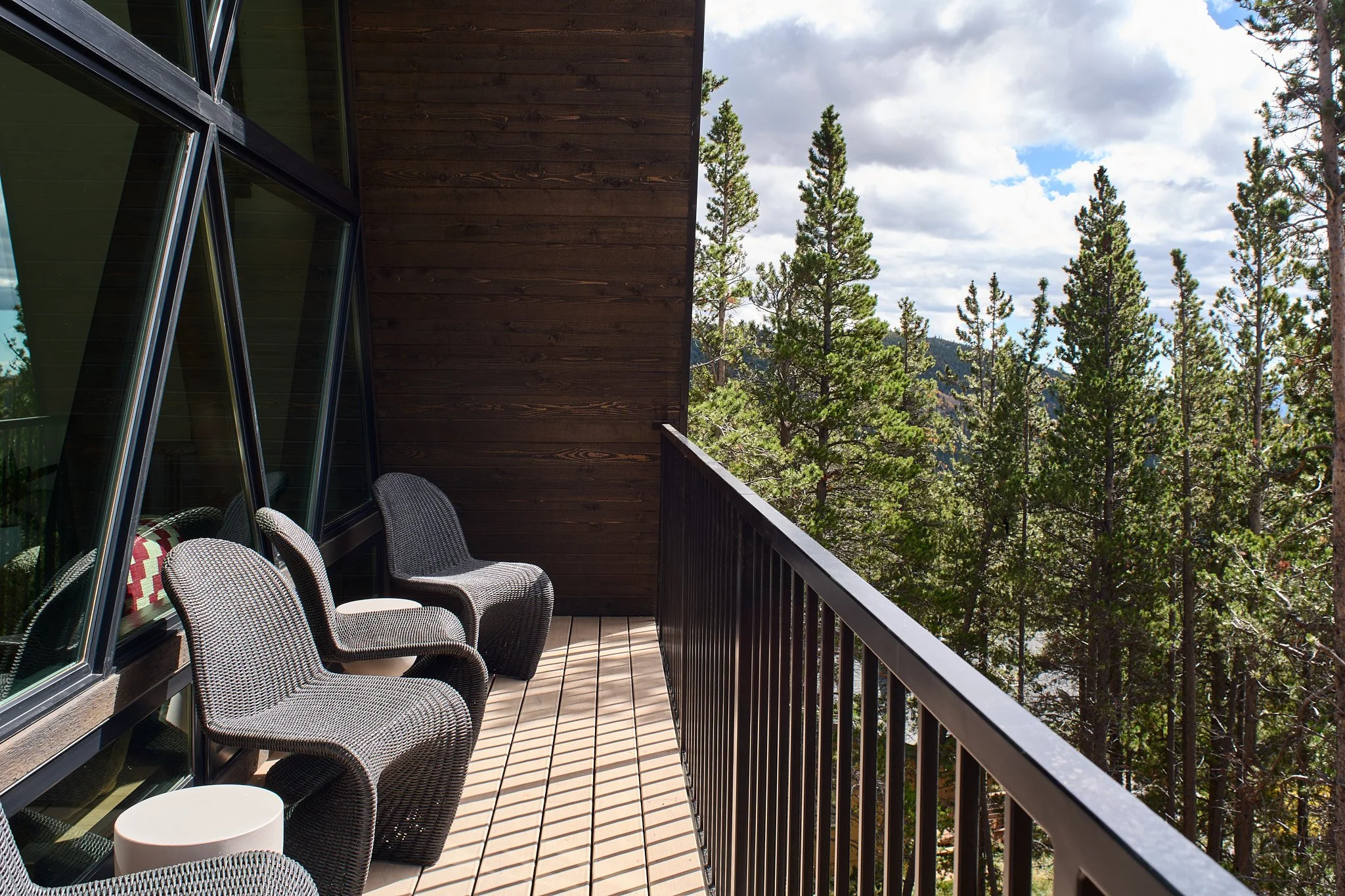 Luxury interior design by Charleston interior designer Sarah Hart for a custom new-build A-Frame luxury short-term rental, featuring white oak cabinetry, handmade ceramics, custom lighting, and bespoke furnishings.