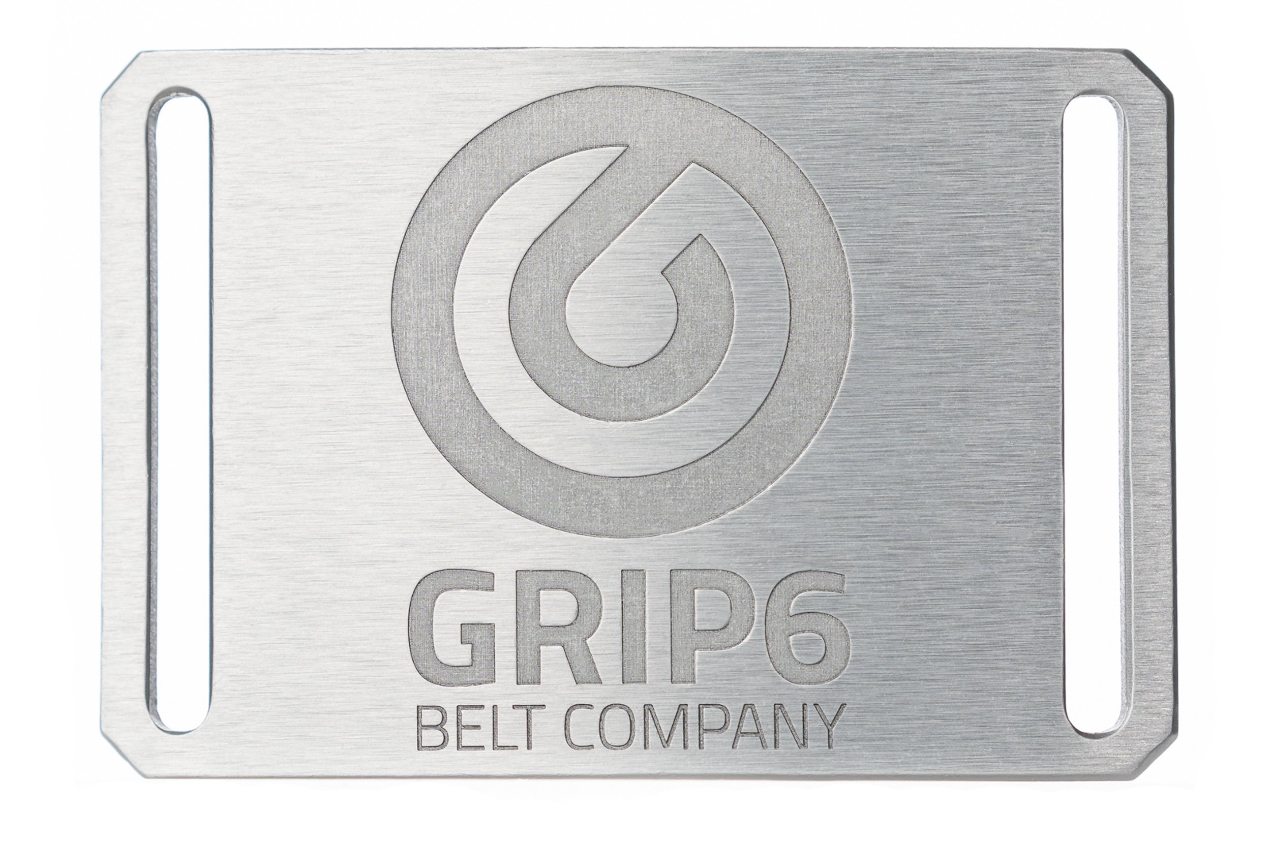 Grip6 Belt Company silver buckle close-up on white background — product photography by BK Captured