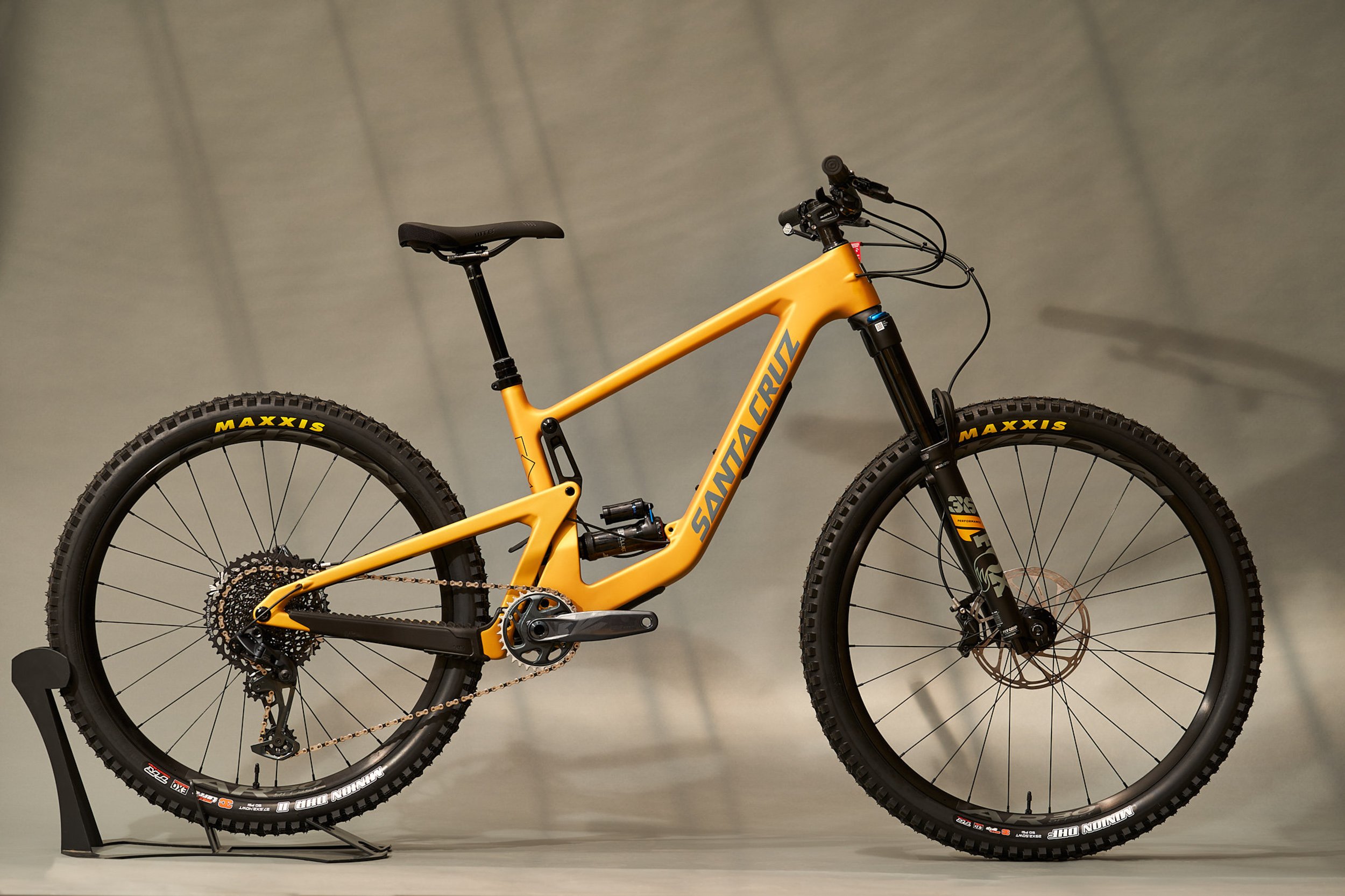 Yellow Santa Cruz Bronson mountain bike in studio — studio product photography by BK Captured